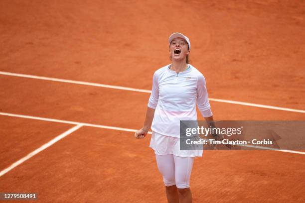 October 10. Iga Swiatek of Poland celebrates after defeating Sofia Kenin of the United States to win the Singles Final on Court Philippe-Chatrier...