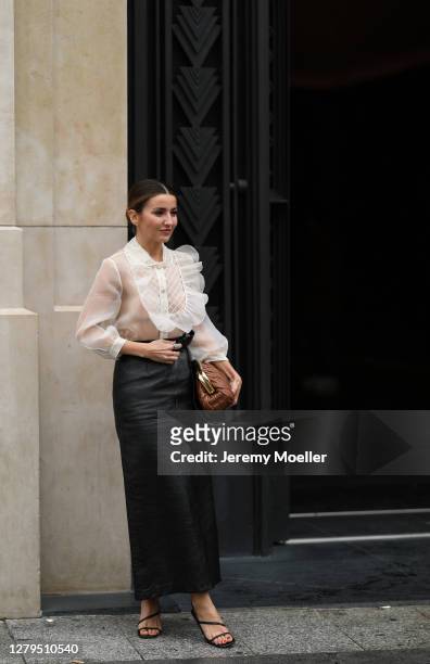 Alexandra Pereira seen wearing a complete Miu Miu look outside Miu Miu during Paris Fashion Week - Womenswear Spring Summer 2021 : Day Nine on...