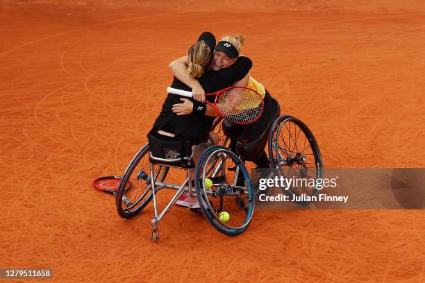 Diede de Groot and Aniek van Koot of the Netherlands celebrate championship point in their Women's Wheelchair Doubles Final against Yui Kamiji of...