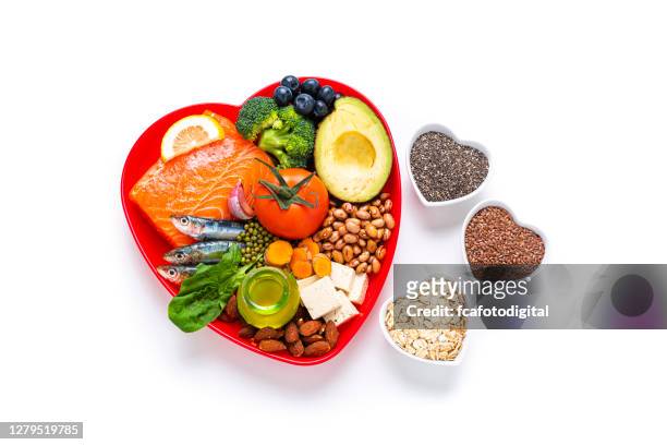 healthy food for low cholesterol and heart care diet shot on wooden table - ldl cholesterol stock pictures, royalty-free photos & images
