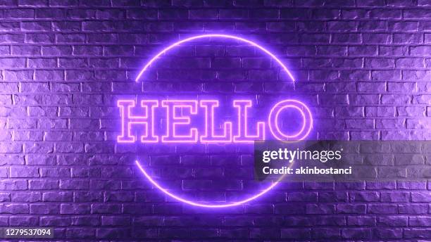 hello neon lighting sign on brick wall - welcome poster stock pictures, royalty-free photos & images