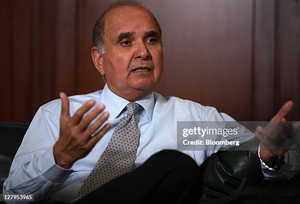 Parvez Ghias, chief executive officer of Indus Motor Co., speaks during an interview in Karachi, Pakistan, on Monday, Oct. 3, 2011. Indus Motor Co.,...