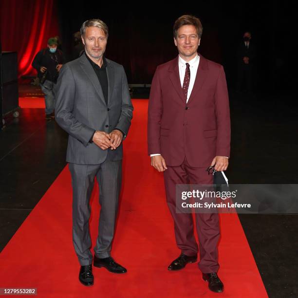 Mads Mikkelsen and Thomas Vinterberg attend the opening ceremony at the 12th Film Festival Lumiere on October 10, 2020 in Lyon, France.