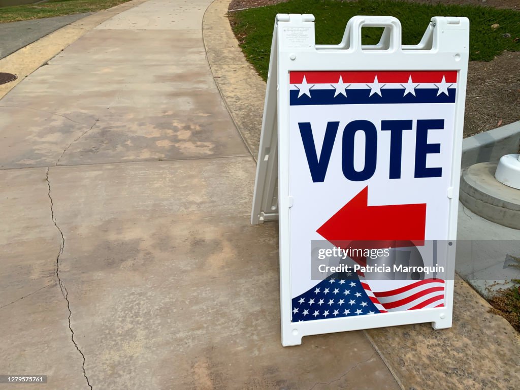 Direction Sign For Election Vote Directional Sign High-Res Stock Photo - Getty Images