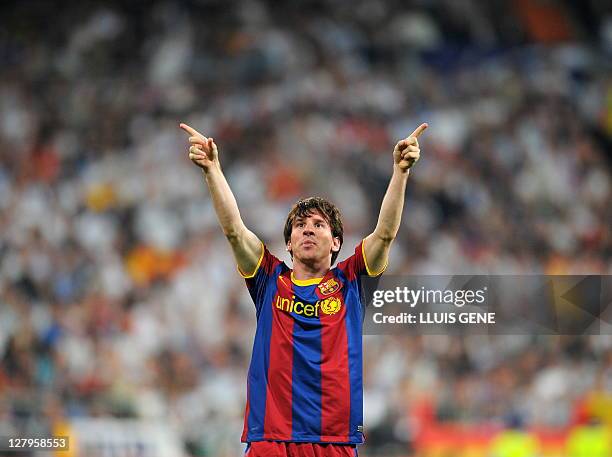 Barcelona's Argentinian forward Lionel Messi celebrates after scoring during the Champions League semi-final first leg football match between Real...