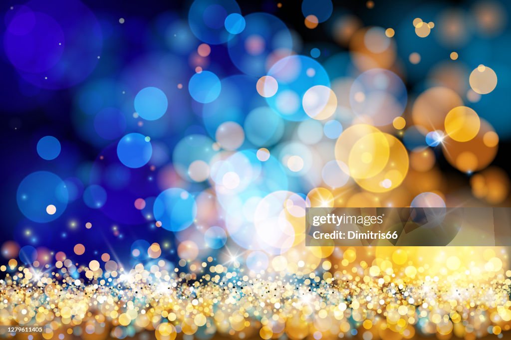Christmas lights defocused background - Gold blue bokeh