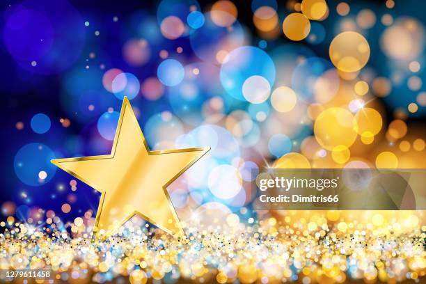 ilustrações de stock, clip art, desenhos animados e ícones de gold star on defocused lights. blue and gold bokeh decoration - award background
