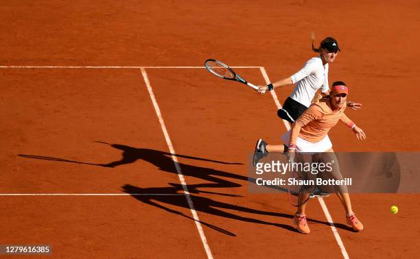 Timea Babos of Hungary and Kristina Mladenovic of France play during their Women's Doubles Final against Desirae Krawczyk of The United States of...