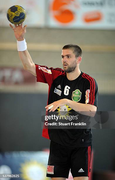 Drago Vukovic of Luebbecke in action during the Toyota Handball Bundesliga match between TuS N-Luebbecke and Eintracht Hildesheim on October 1, 2011...