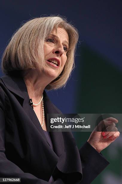 Theresa May, Home Secretary and Minister for Women and Equalities addresses delegates during the Conservative Party Conference at Manchester Central...