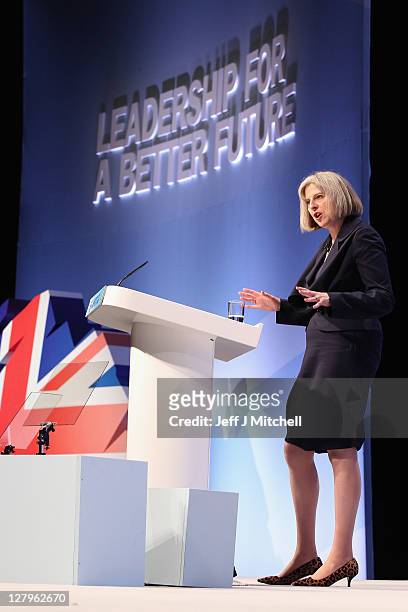 Theresa May, Home Secretary and Minister for Women and Equalities addresses delegates during the Conservative Party Conference at Manchester Central...