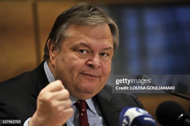 Greek Finance minister Evangelos Venizelos gestures during a press conference in Athens on October 4, 2011. Unionists blocked entrances at the...