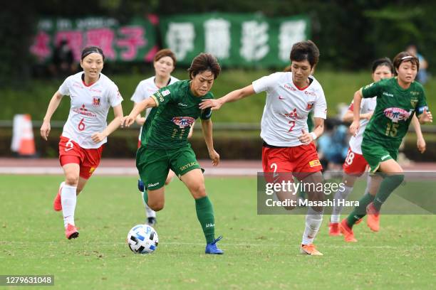 Rikako Kobayashi of NTV Beleza and Kana Osafune of Urawa Reds Ladies compete for the ball during the Nadeshiko League match between Nippon TV Tokyo...