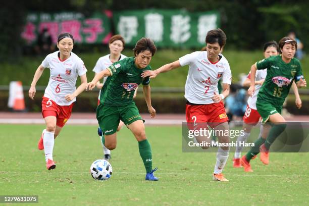 Rikako Kobayashi of NTV Beleza and Kana Osafune of Urawa Reds Ladies compete for the ball during the Nadeshiko League match between Nippon TV Tokyo...