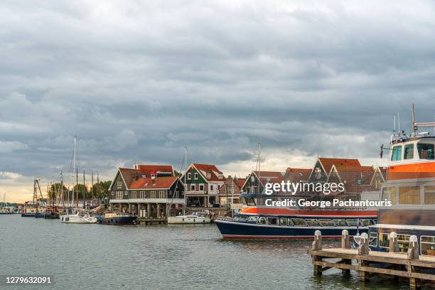 boats on the harbor of volendam, holland - volendam stock pictures, royalty-free photos & images