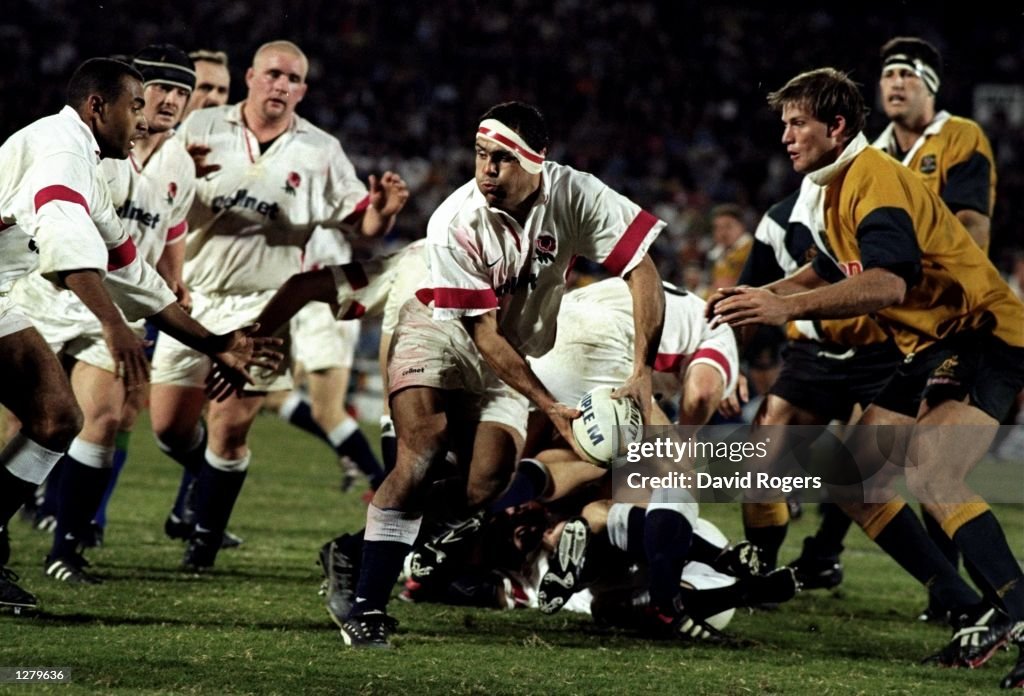 Richard Pool Jones Rugby Richard Pool-Jones of England passes to team mate Spencer Brown... News ...