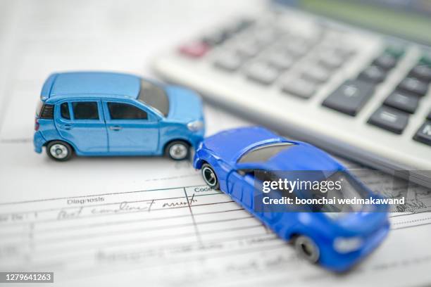 concept for car insurance and financial. - seguro de automóvil fotografías e imágenes de stock