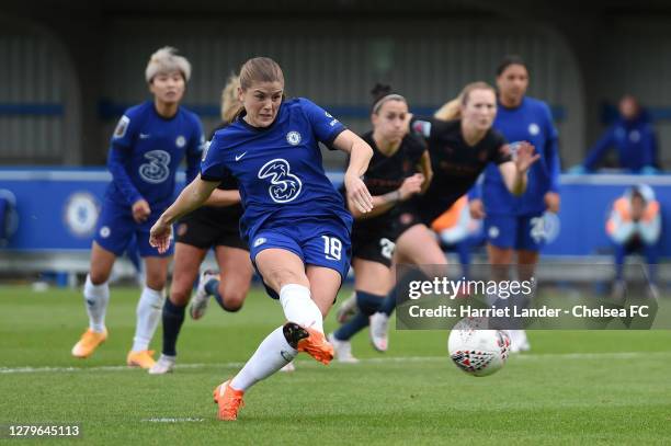 Maren Mjelde of Chelsea scores a penalty for her team's first goal during the Barclays FA Women's Super League match between Chelsea Women and...