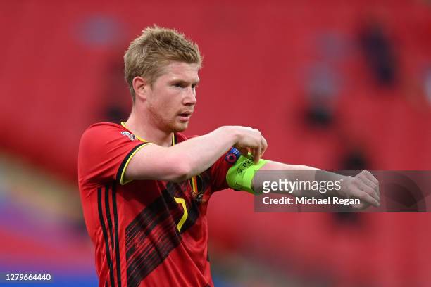 Kevin De Bruyne of Belgium adjusts his armband during the UEFA Nations League group stage match between England and Belgium at Wembley Stadium on...