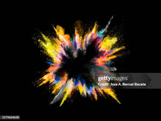 explosion by an impact of a cloud of particles of powder and smoke of multicolored on a black background. - colourful studio shots stockfoto's en -beelden