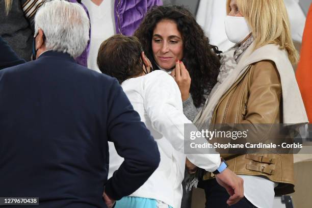 Rafael Nadal of Spain receives a congratulatory kiss from his wife Xisca Perello after his victory against Novak Djokovic of Serbia in the Singles...