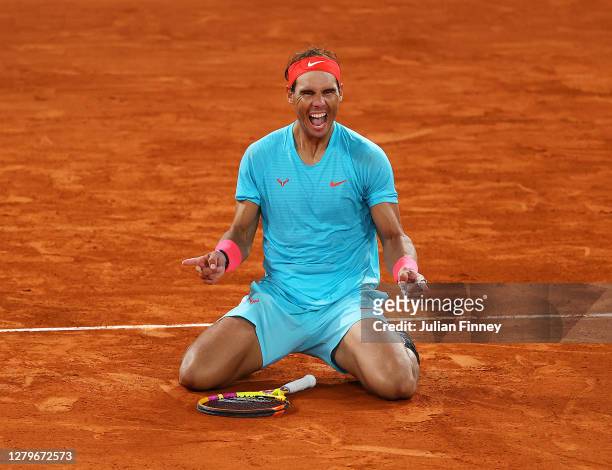 Rafael Nadal of Spain celebrates after winning championship point during his Men's Singles Final against Novak Djokovic of Serbia on day fifteen of...