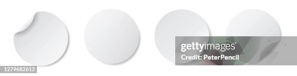 realistic paper stickers - round adhesive tags - wrapped white paper bookmarks - blank labels - vector stock illustration - throwing paper stock illustrations