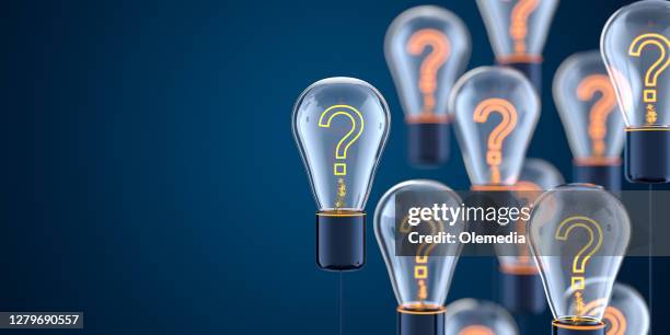innovation and new ideas lightbulb concept with question mark - questioning stock pictures, royalty-free photos & images