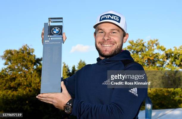 Tyrrell Hatton of England 1holding the winners trophy after the final round of the BMW PGA Championship at Wentworth Golf Club on October 11, 2020 in...