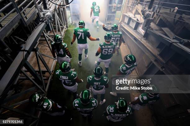 New York Jets take the field prior to the start of the game against the Arizona Cardinals at MetLife Stadium on October 11, 2020 in East Rutherford,...