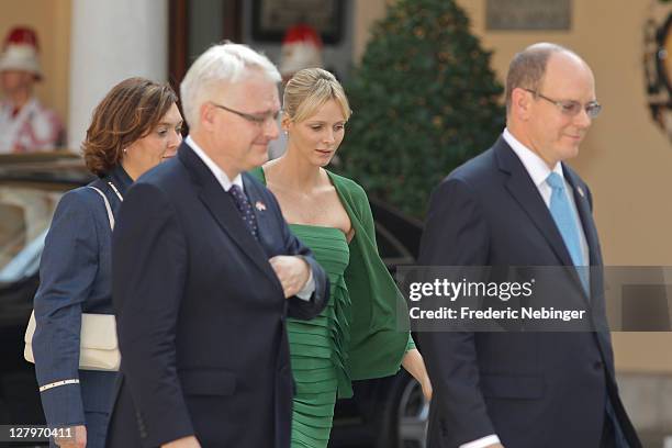 Prince Albert II of Monaco and Princess Charlene of Monaco greet president Of Croatia Ivo Josipovic during the state visit at Monaco Palace on...