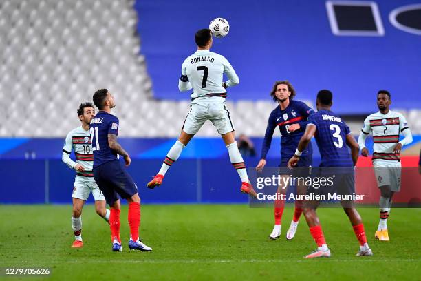 Cristiano Ronaldo of Portugal jumps for the ball during the UEFA Nations League group stage match between France and Portugal at Stade de France on...