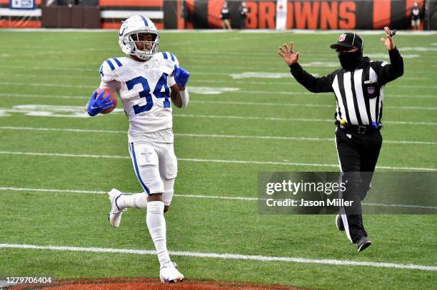 Isaiah Rodgers of the Indianapolis Colts scores a touchdown on a kick return in the third quarter against the Cleveland Browns at FirstEnergy Stadium...