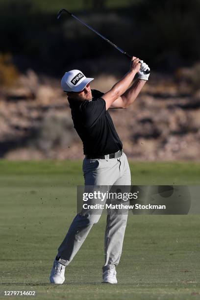 Austin Cook hits from the fairway on the 18th hole during the final round of the Shriners Hospitals For Children Open at TPC Summerlin on October 11,...