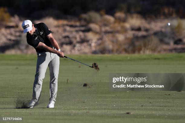 Austin Cook hits from the fairway on the 18th hole during the final round of the Shriners Hospitals For Children Open at TPC Summerlin on October 11,...