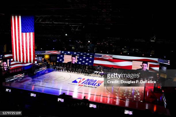 The Los Angeles Lakers and the Miami Heat kneel during the National Anthem prior to the start of the game aMiami Heat in Game Six of the 2020 NBA...