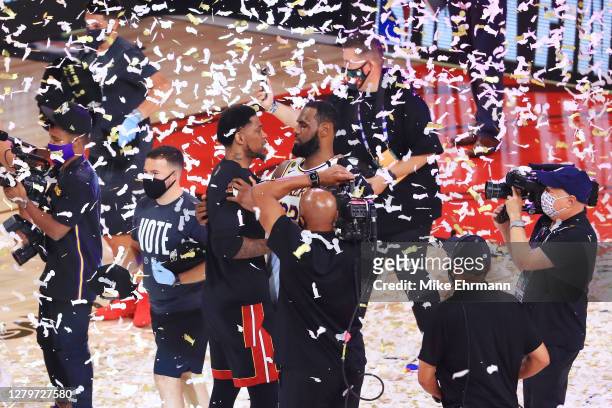 LeBron James of the Los Angeles Lakers hugs Udonis Haslem of the Miami Heat after winning the 2020 NBA Chmpionship in Game Six of the 2020 NBA Finals...