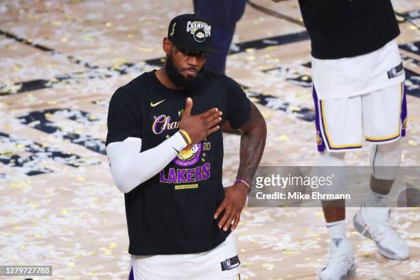 LeBron James of the Los Angeles Lakers reacts after winning the 2020 NBA Championship over the Miami Heat in Game Six of the 2020 NBA Finals at...
