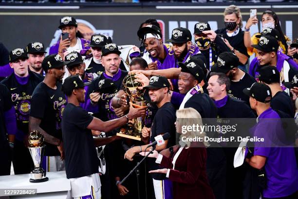 The Los Angeles Lakers celebrate with the trophy after winning the 2020 NBA Championship Final over the Miami Heat in Game Six of the 2020 NBA Finals...