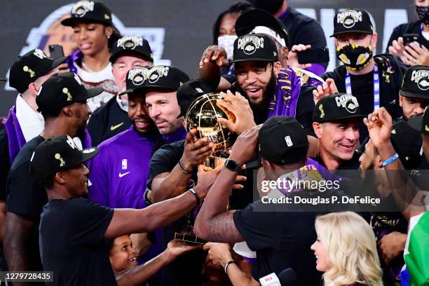 The Los Angeles Lakers celebrate with the trophy after winning the 2020 NBA Championship Final over the Miami Heat in Game Six of the 2020 NBA Finals...