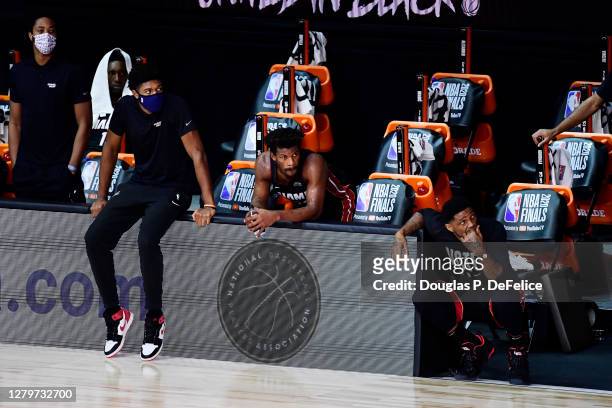 Jimmy Butler of the Miami Heat and the Miami Heat bench react during the fourth quarter against the Los Angeles Lakers in Game Six of the 2020 NBA...