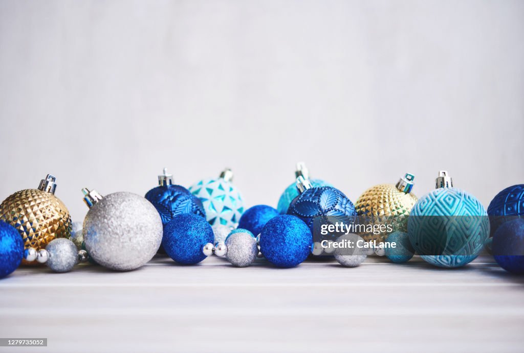 Christmas Background with Blue Silver and Gold Ornaments