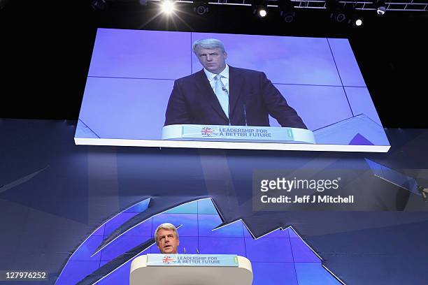 Secretary of State for Health Andrew Lansley gives his keynote speech during the Conservative Party Conference at Manchester Central on October 4,...