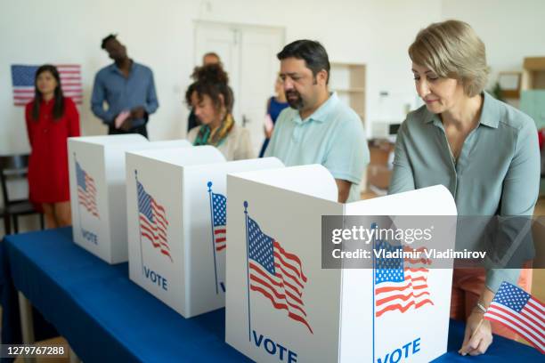 voting day - polling place stock pictures, royalty-free photos & images