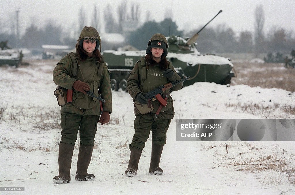 Russian paratroopers guard the camp of t