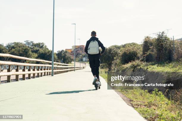 Scooted Back Back Of Scooter Photos and Premium High Res Pictures - Getty Images