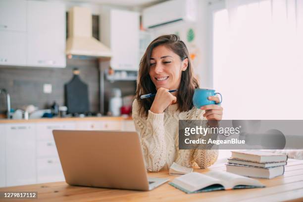 female student home schooling during covid-19 - west asia stock pictures, royalty-free photos & images