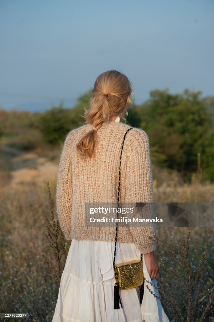 Close up of a woman wearing handmade wool sweater