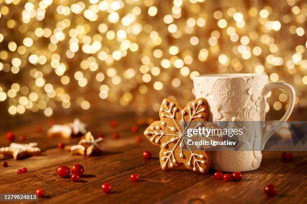 white cup filled with hot chocolate - christmas coffee stock pictures, royalty-free photos & images