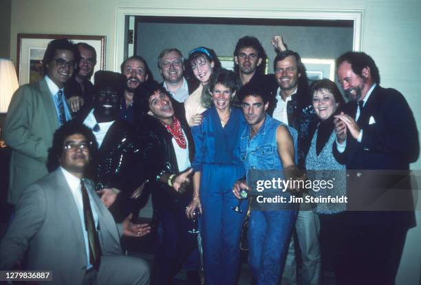 Rock band Journey and crew from Columbia records pose of a photo in Bloomington Minnesota on September 25, 1986.